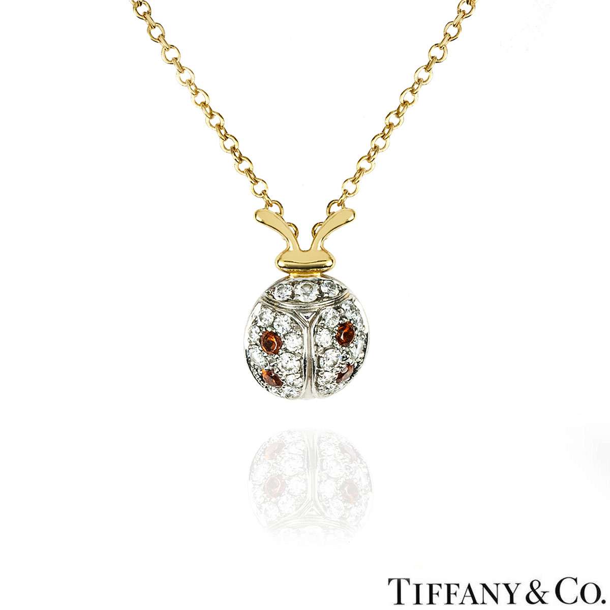 Tiffany & Co. Yellow Gold Diamond and Garnet Schlumberger Ladybug Pendant Tiffany & Co. Yellow Gold Diamond and Garnet Schlumberger Ladybug Pendant